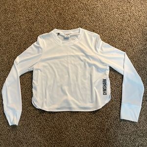 Long sleeve white drifit top from Gymshark
